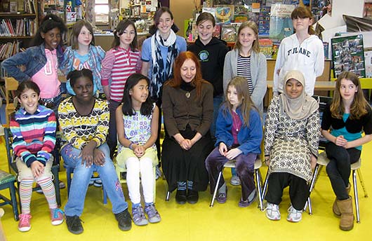 students with Phoebe Stone at the Haggerty Schoolin Cambridge, MA